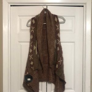 Women’s sleeveless open front sweater